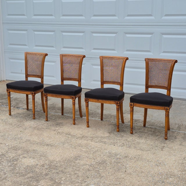This is an elegant set of 4 directoire style cane back dining chairs. Directoire style emerged in France during the late...