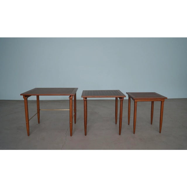 We have a beautiful set of original 1950's Mid-century Modern nesting tables for $1,550 the set. They were manufactured by...