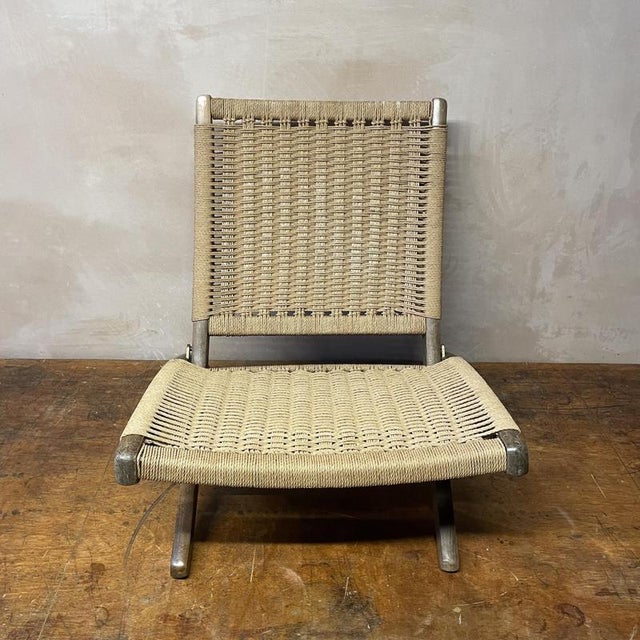 Vintage folding rope chair designed in the style of Ebert Wels. The frame has been cleaned and waxed and is in good...