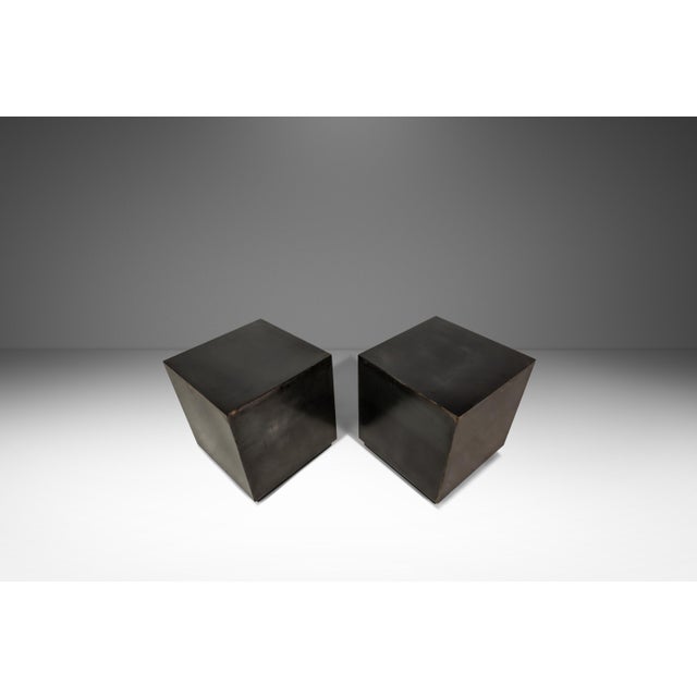 Introducing a sleek set of minimalist cube end tables cut from steel and replete with a splendid, character-rich patina....