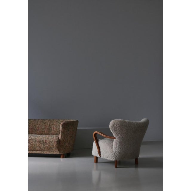 Scandinavian Modern lounge chair made in the 1940s by a Danish Cabinetmaker. Great dramatic angles and proportions with...