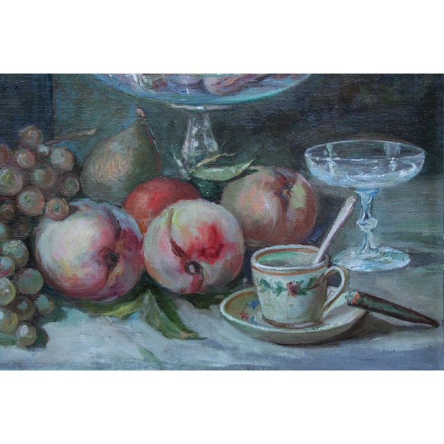 Beautiful modern still life done in the baroque style: staged fruit, glass with reflections of light from an unseen...