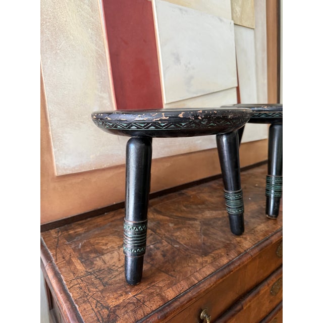 Pair of sculptural coffee table stools attributed to Ettore Zaccari, featuring a distinctive organic form and richly...