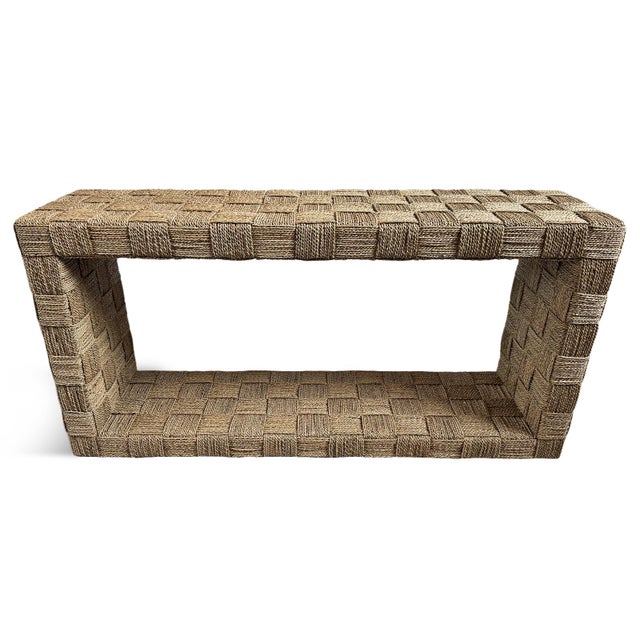 Hand woven seagrass console table over sturdy mahogany frame. Open rectangular modern design. Perfect for a coastal...