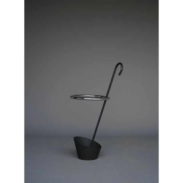 A rare design classic. A Postmodern umbrella stand designed by Shiro Kuramata for Pastoe in 1986. In a design typical of...