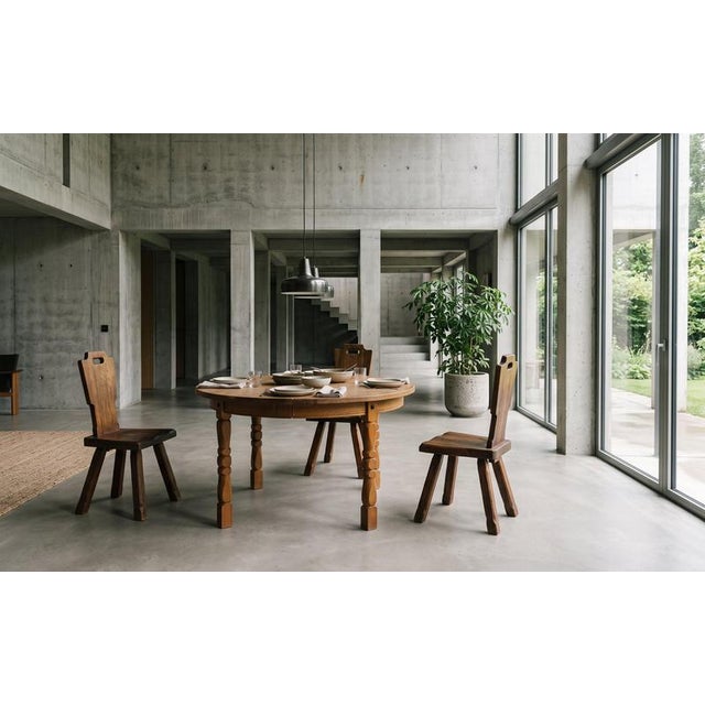 Danish Brutalist dining table in oak, dating from the 1960s. The table combines a robust, sculptural design with practical...