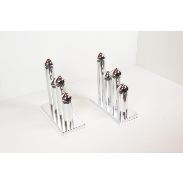 Beautiful and rare set of chrome wall lamps by Gaetano Sciolari. 4 metal tubes, each containing one light point. Both...