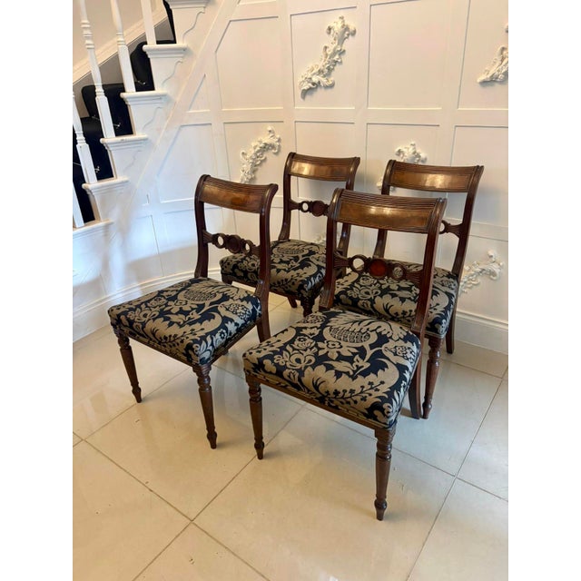 A very elegant and original set of four antique Regency mahogany dining chairs dating from the early 19th century. These...