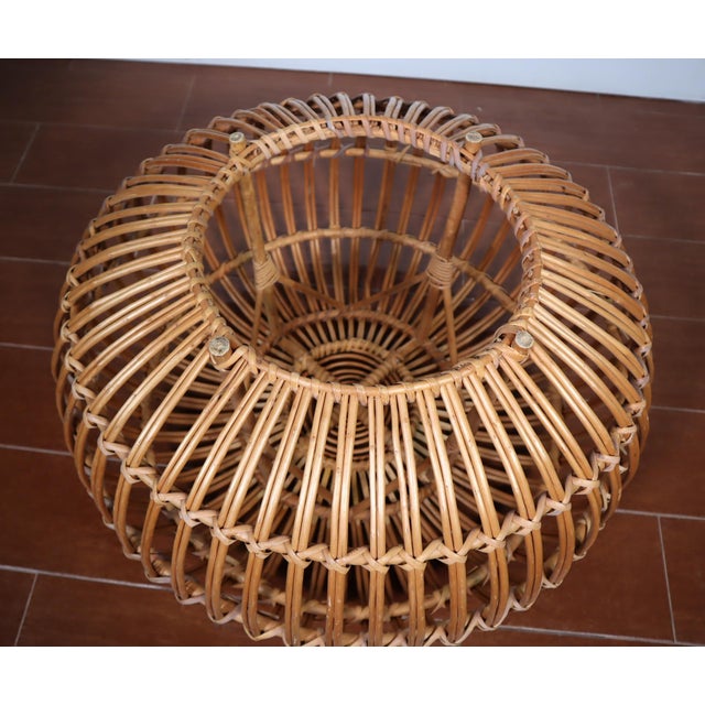 Very cool vintage woven rattan pouf ottoman by Franco Albini for Vittorio Bonacina. It is in very good vintage condition...