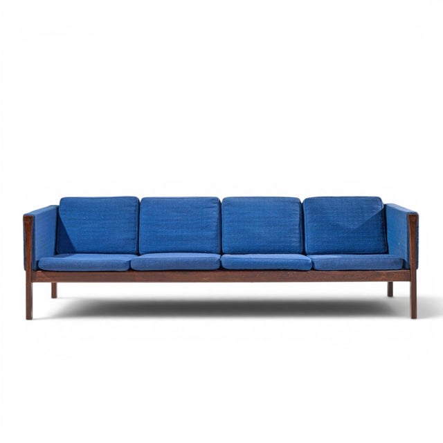 Hans Wegner for AP Stolen AP62 Mid Century Rosewood 4 Seater Sofa This sofa measures: 98 wide x 31 deep x 29 inches high,...
