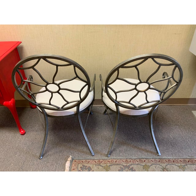 21st century pair of iron armchairs with pewter finish. Great Hollywood Regency style. Label marked made by or for Sel’s...