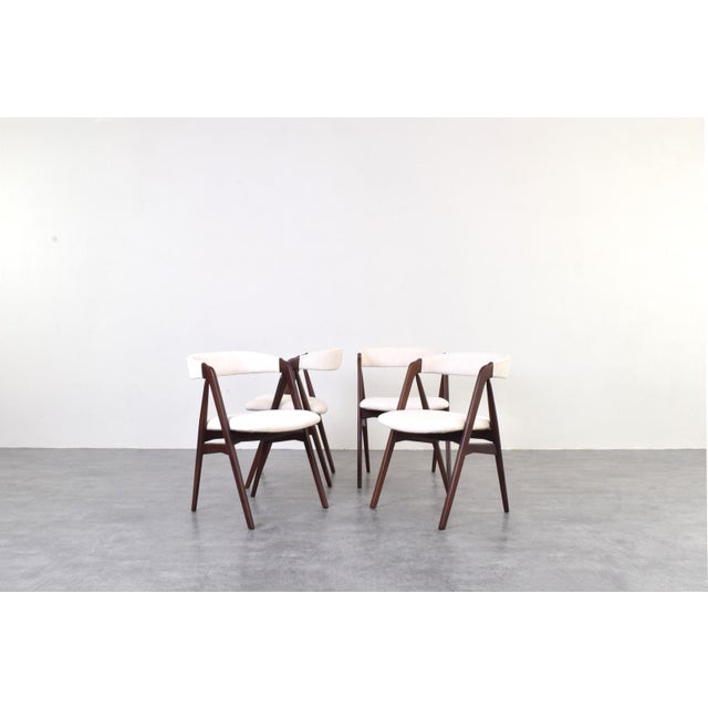 This set of four model 205 chairs was designed in the 1960s by Thomas Harlev for Farstrup. The frame of the chairs is made...