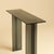 Assembled from Italian glass alone, the Naz is a slim, upright table made to sit against a wall that occupies a room...