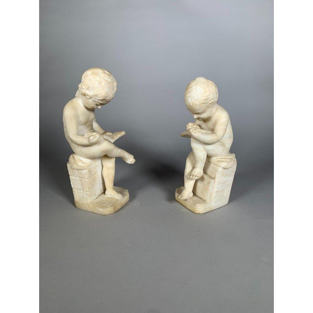 Two 19th Century Marble Sculptures: The Child Scribe and The Reader, After Lemire For Sale - Image 4 of 11