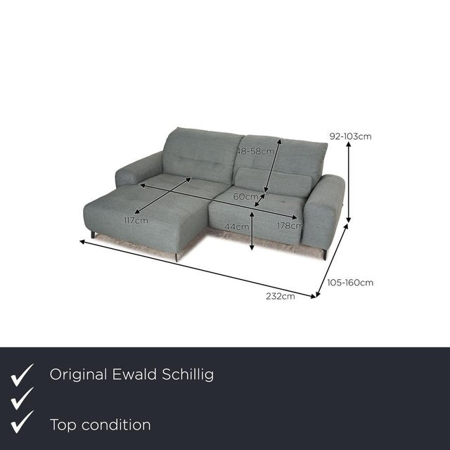 The Gladiola Plus sofa by Ewald Schillig is upholstered in turquoise fabric and stands on dark, slender legs. Its simple,...