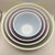 Late 1940s, approximately 1946-1949 with circular backstop and the pronounced thick highly raised circular rim foot....