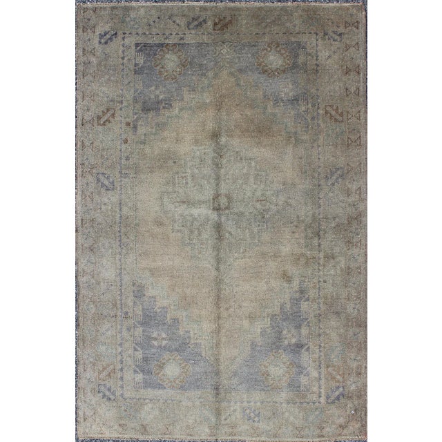 Textile Vintage Turkish Oushak Rug With Muted Colors and Central Medallion Design For Sale - Image 7 of 7