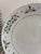 A festive vintage finds set of 24 dinner plates in the Holly Berry pattern, each decorated with a hand-painted-style holly...