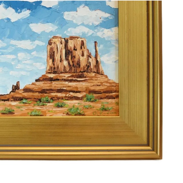 Impressionist oil painting on artist panel of a southwestern landscape oil painting of Monument Valley, Utah displayed in...