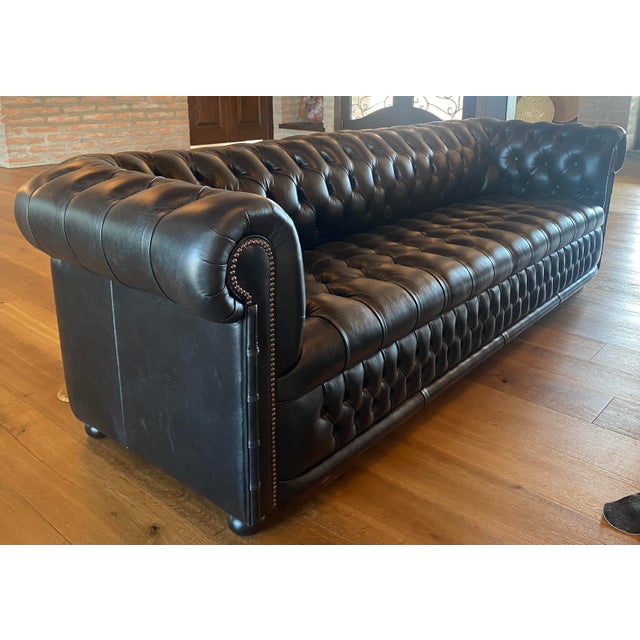 Beautiful black leather chesterfield sofa custom made by Fleming Howland. The workmanship is impeccable. This sofa is less...