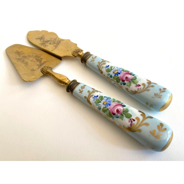 Rustic European Antique Early 1900's Neoclassical Hand Painted Floral Gilded Porcelain Brass Fish Serving Utensils - Set of 2 For Sale - Image 3 of 13