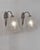 Hettier et Vincent A wonderful pair of 1925 French art deco wall sconces in nickel plated bronze and clear frosted...