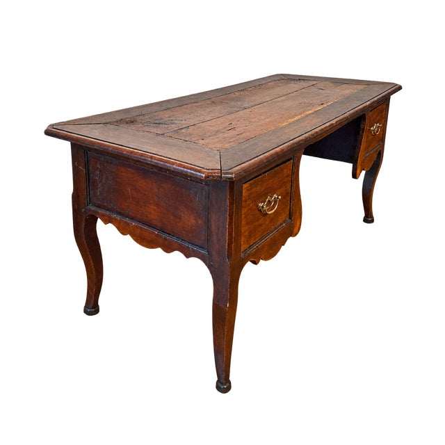 Width: 74 inches Height: 30.5 inches Depth: 32.5 inches A beautifully proportioned antique writing desk in the French...