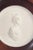 Meissen Biscuit plaque, c. 1970s. Circular relief plaque in white biscuit porcelain with a classical profile portrait of...