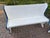 A handsome matched pair of vintage wooden booth benches. Originally part of a dinette set, these benches have the graceful...