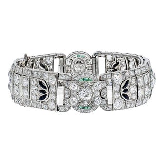 1930s Art Deco Old-European Cut Diamond, Emerald and Onyx Platinum Art Deco Bracelet For Sale