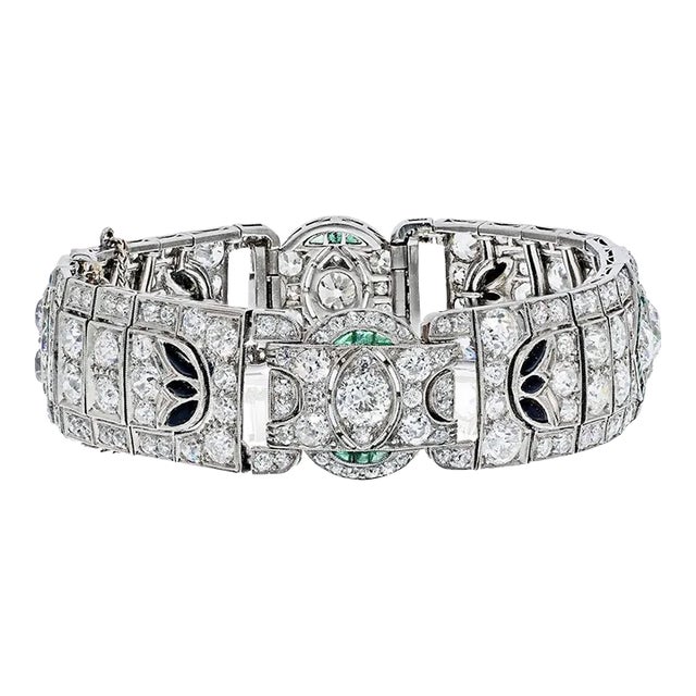 1930s Art Deco Old-European Cut Diamond, Emerald and Onyx Platinum Art Deco Bracelet For Sale