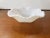 This is a Vintage L.E. Smith Milk Glass Dish with Scalloped Edge. It measures 1 3/4" high and 6 1/8" square. The piece is...