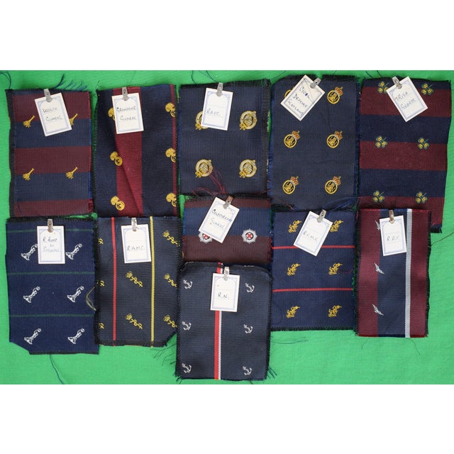 Welch Margetson 9 5/8" x 7 1/4" w/ 11 loose swatches w/ stock list [20] pp. c1983 booklet of regimental, school & club...