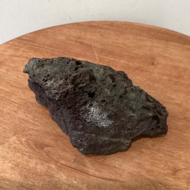 The product is a Japanese Suiseki, also known as a viewing stone, which is a natural creation from Japan. It is shaped...