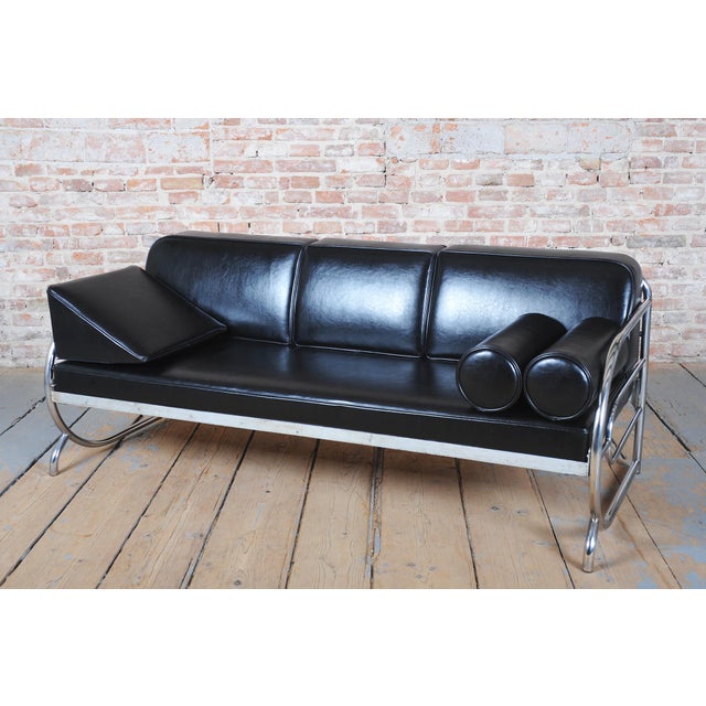 This functionalist sofa is a monumental and exceptionally rare piece of furniture designed in the pure Bauhaus style from...
