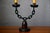 Raw and unique, this two-candle candelabra reflects the spirit of an era when craftsmanship celebrated its imperfections...
