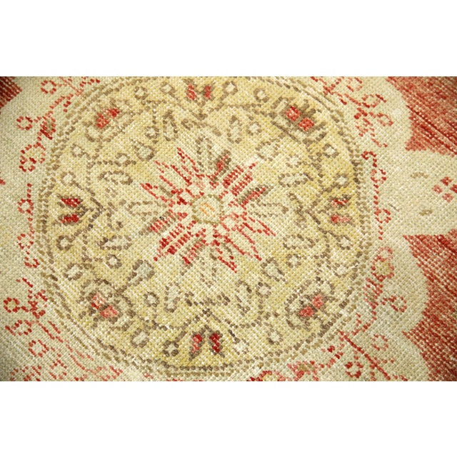 Introducing a one-of-a-kind vintage Turkish hand-knotted wool rug, carefully crafted by skilled artisans using traditional...