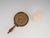 This exquisite object blends rustic charm with elegant materiality, crafted as a heavy table candlestick from the 1960s in...