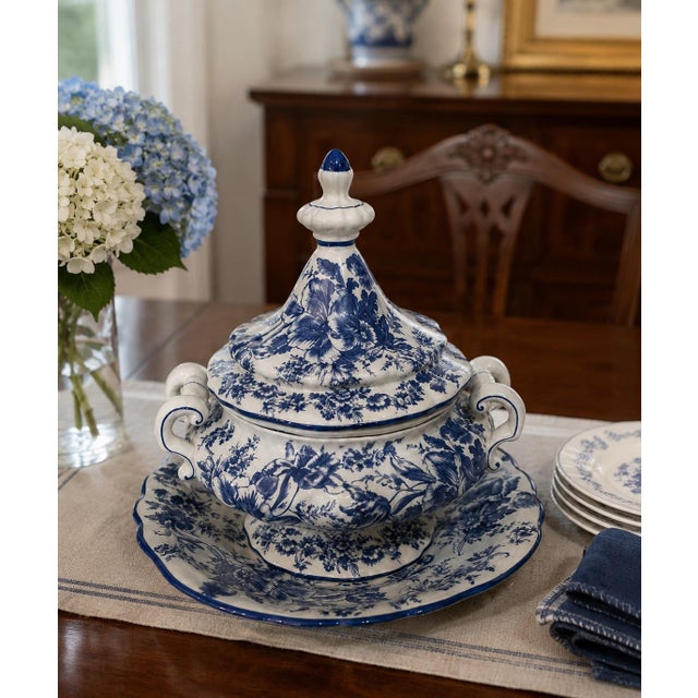 A classic Royal Worcester English porcelain covered tureen, rendered in an elegant blue and white floral transferware...
