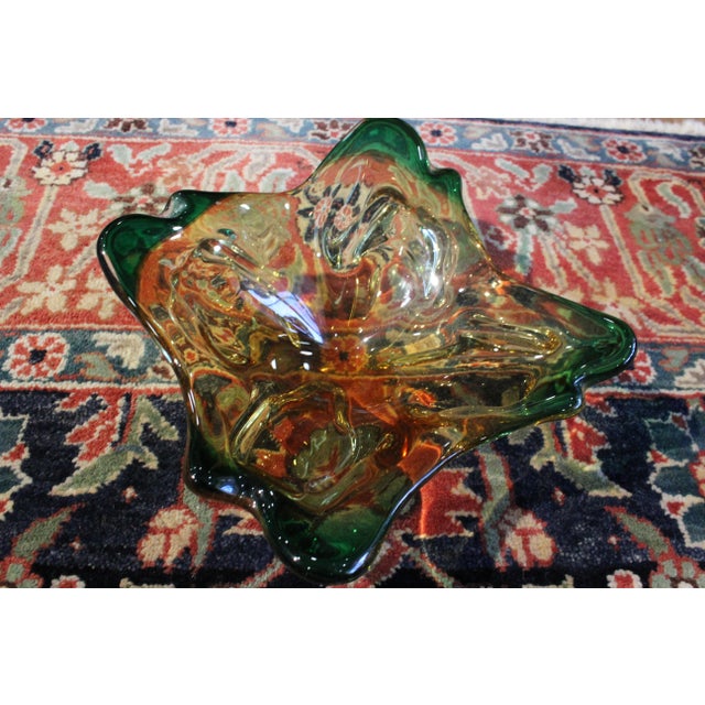 This simple, but beautiful, hand-blown glass bowl has been attributed to Murano. The biomorphic shape, lovely combination...