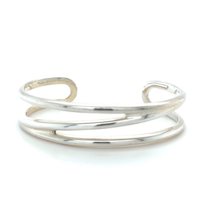 A rare Tiffany & Co. Zig Zag cuff bracelet crafted in sterling silver, featuring an open-weave design with distinctive...