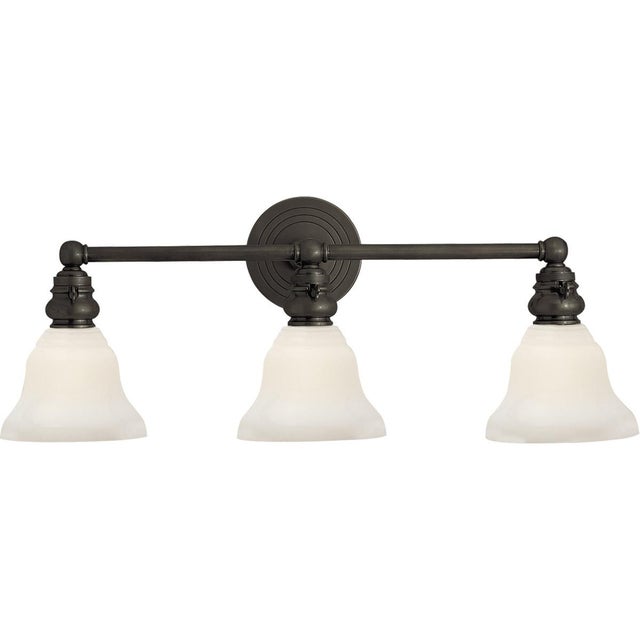Boston Functional Triple Light in Bronze with White Glass Designer: Chapman & Myers Height: 9" Extension: 9.5" Backplate:...