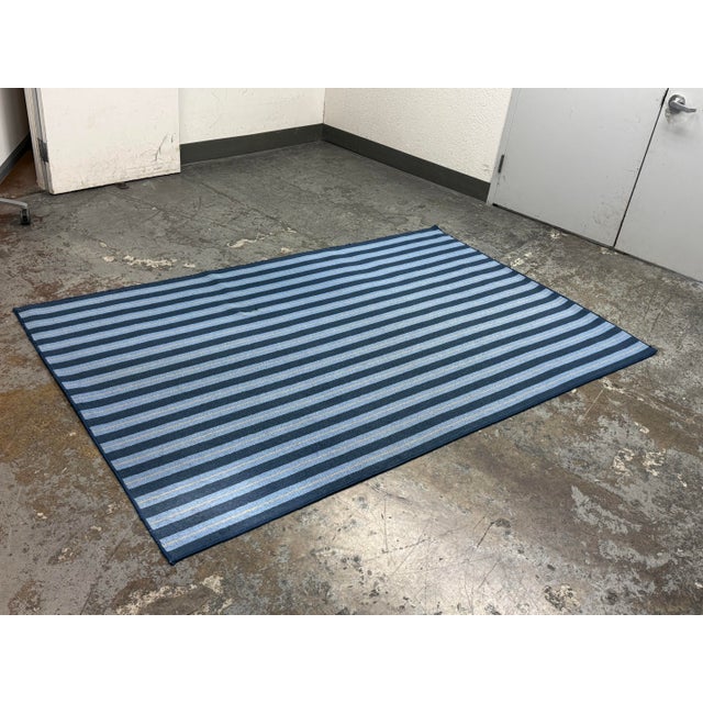 Design Plus Gallery presents a 5ft 6in x 8ft 5in Harbor Blue Cabo Del Sol Area Rug from Karastan. The rug is tufted and...