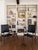 A pair of high-back chairs designed by Johannes Andersen and made in Denmark in 1960. Sculptural solid rosewood frames...