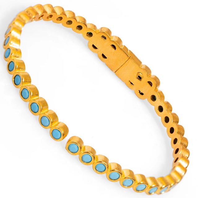 Embrace the uplifting energy of the Turquoise Gemstone & Gold Dainty Bangle Bracelet, a perfect blend of elegance and...
