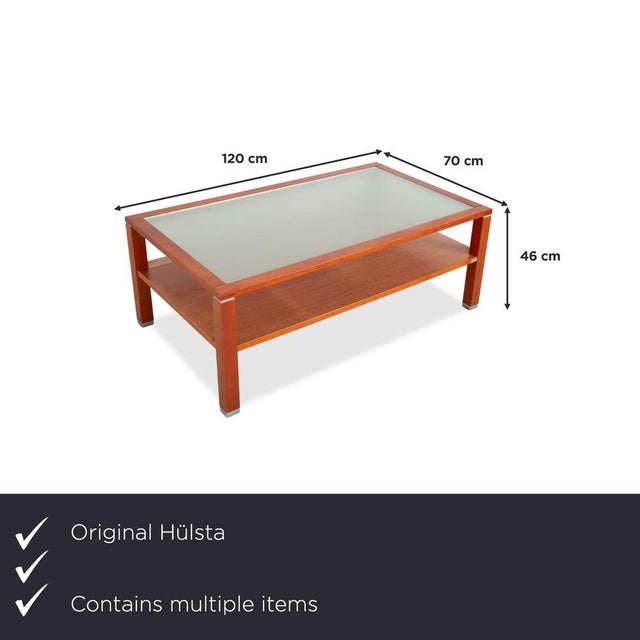 Hülsta Coffee Table Ensemble: Double the Elegance in Wood and Glass. This set from the traditional German brand Hülsta...
