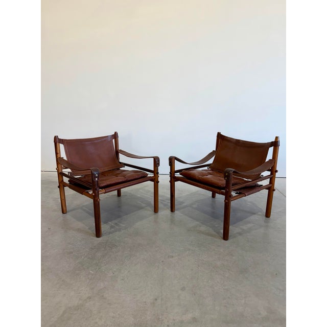 Mid Century Arne Norell Sirocco Rosewood and Brown Leather Safari Chair Pair For Sale In Tampa - Image 6 of 12