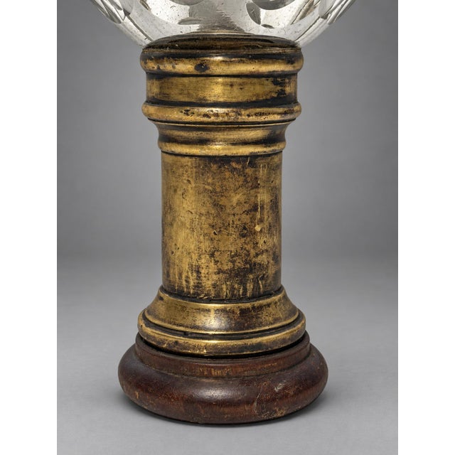 A French mercury glass newel post finial with an affixed bronze base, late nineteenth century. The egg-shaped glass body...