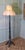 A Black Chinoiserie Lacquer Decorated Standard Lamp This is a good quality Chinoiserie lamp it stands on a sturdy 4 footed...