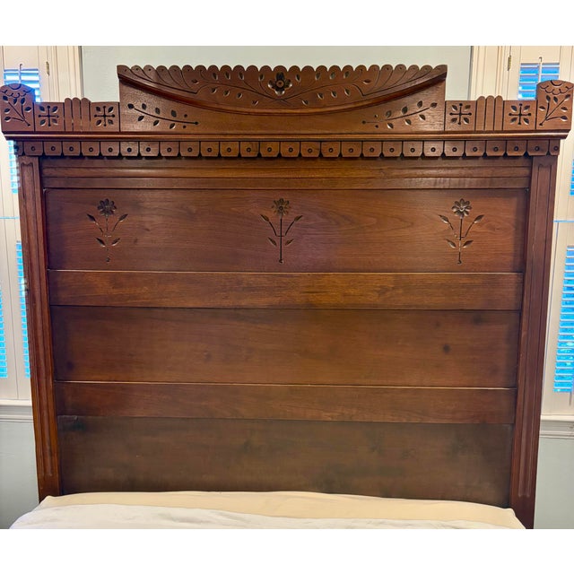 This is an absolutely stunning antique Victorian Eastlake Full sized carved bed. It features gorgeous carvings and...